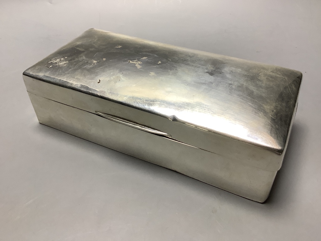 A George V silver mounted rectangular cigarette box, Birmingham, 1929, 19.3 cm.